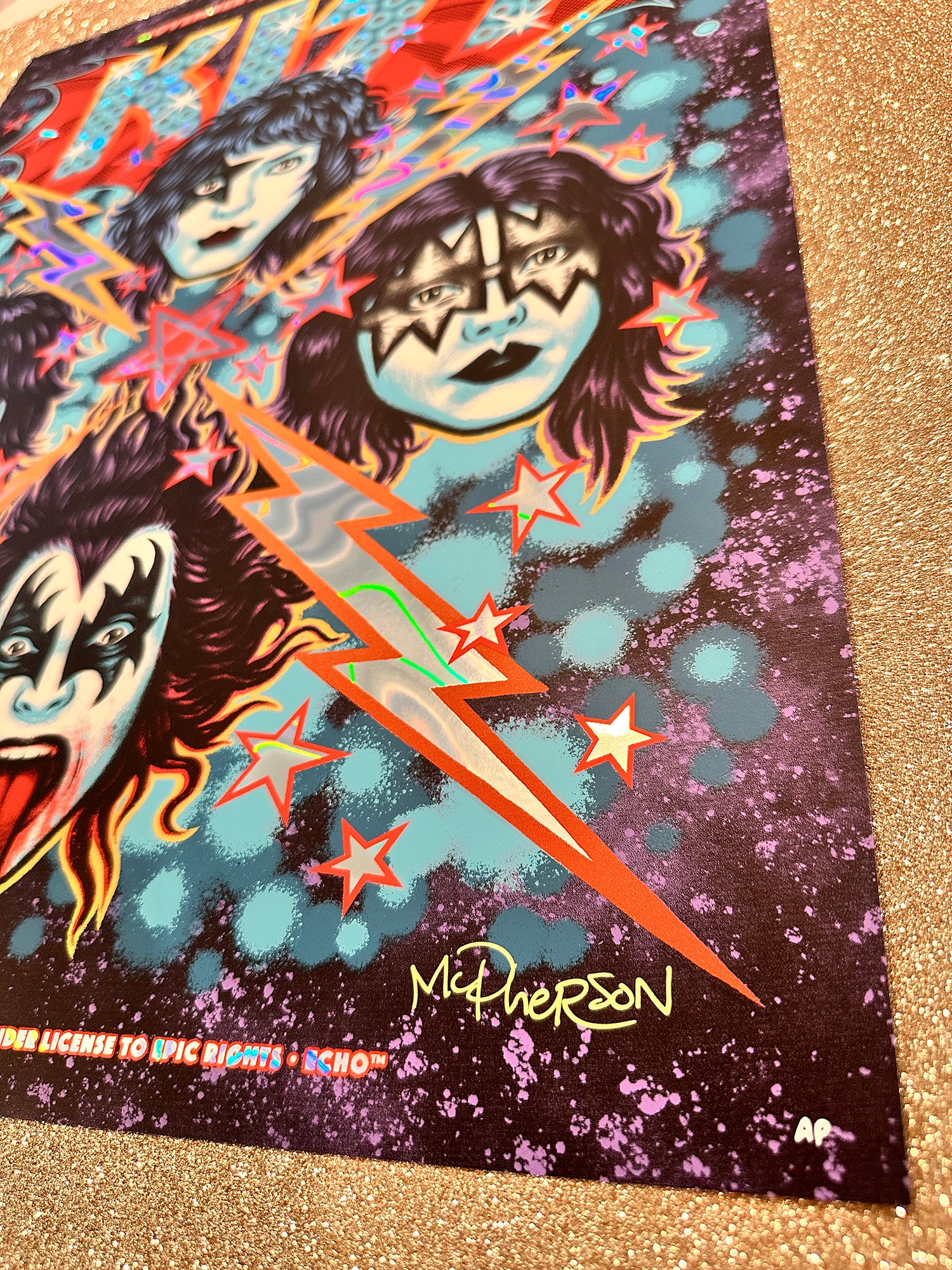 Colorful poster with KISS band members and a lightning bolt design on a glittery surface.