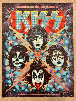 Kiss band members with colorful makeup on a starry background, featuring the band name 'Kiss'.