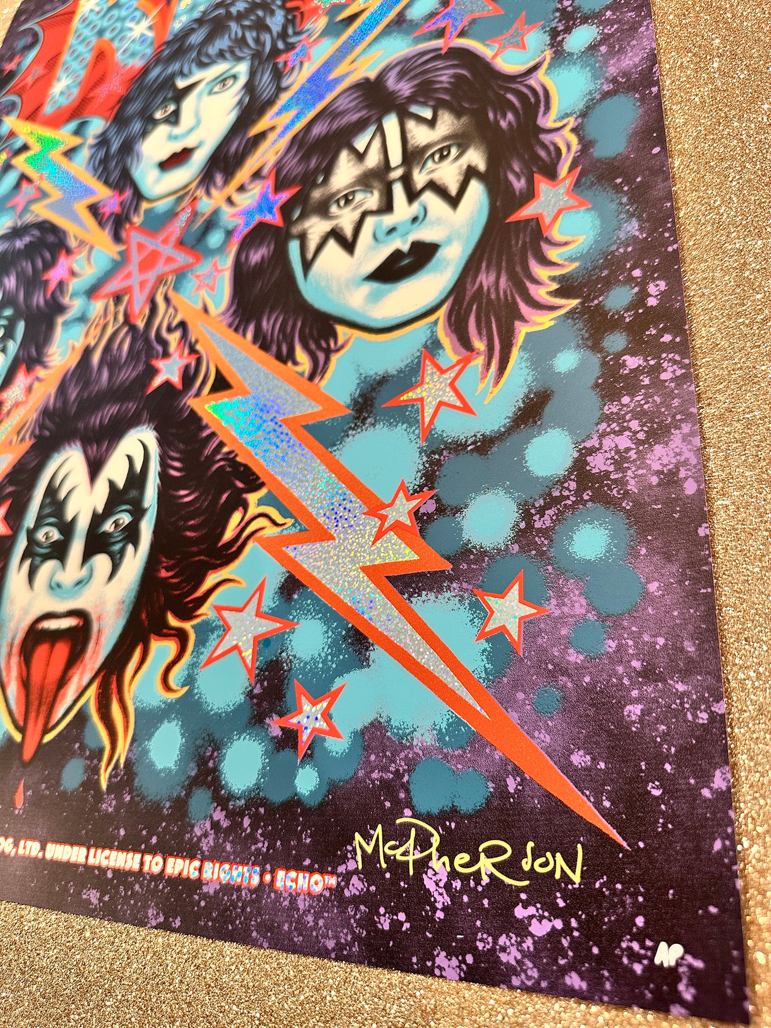 Colorful poster with three faces and a lightning bolt design on a dark background.